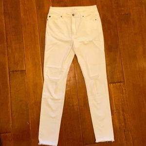 Brand new without tags. Women’s distressed white jeans.